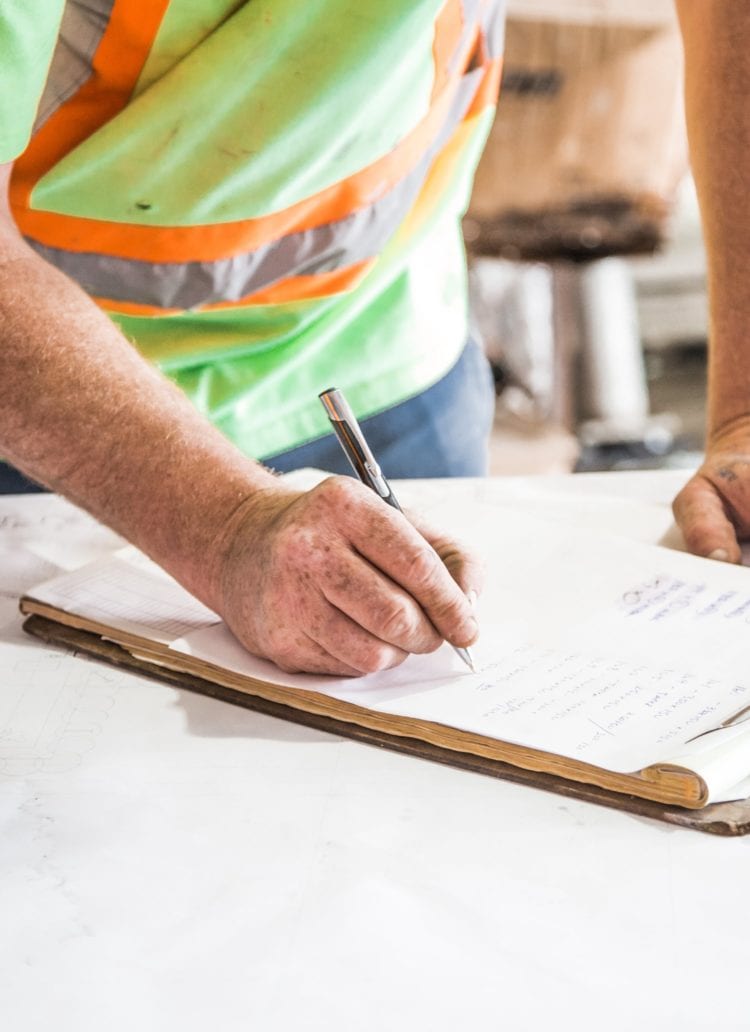 man working as apprentice for his construction degree