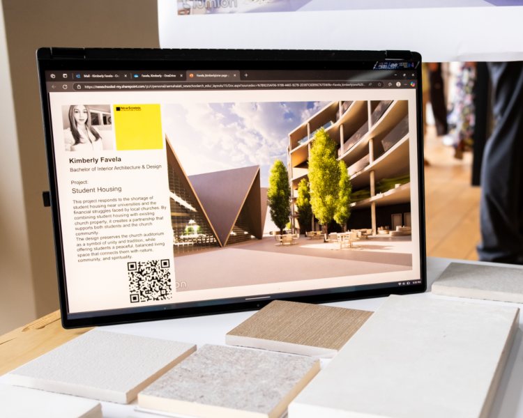 A tablet that shows the rendering of a modern student housing project designed by a Newschool student in the Bachelor of Interior Architecture and Design