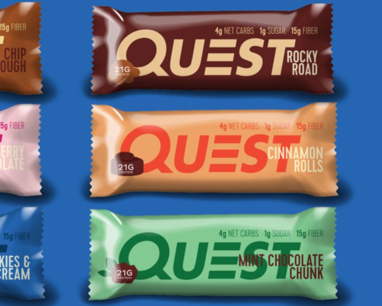 3 packages stacked one above the other of Quest Nutrition Bars. Their design is a rebranding project by a NewSchool of Architecture & Design student.