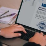 Laptop screen showing Carnegie's email announcing the recognition