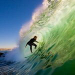 A man surfing a wave in san diego