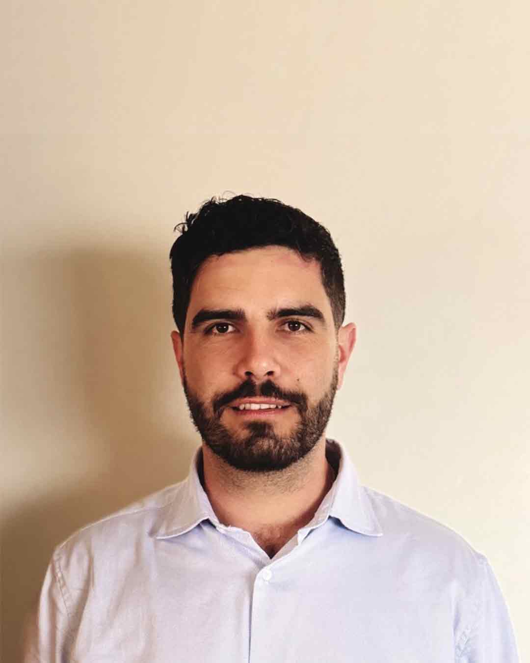 Headshot of Kevin Assaf smiling